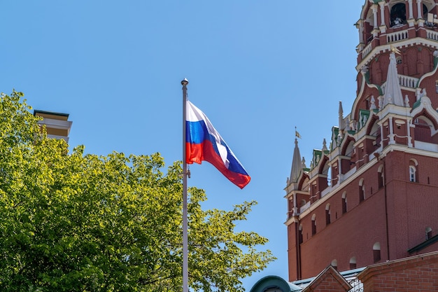 Moscow Russia the national flag of the Russian Federation at the ancient walls of the Kremlin