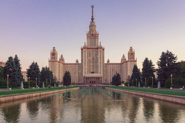 Moscow State University building with a pond in the foreground