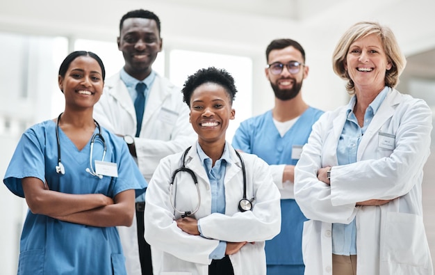 Photo the most important person in a healthcare team is the patient portrait of a group of medical practitioners standing together in a hospital