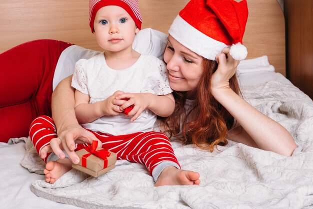 Mother and baby having fun and relaxing at home