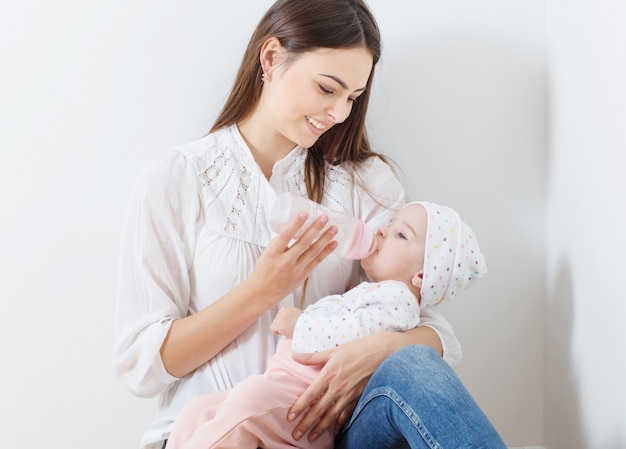 Mother and baby  together at home