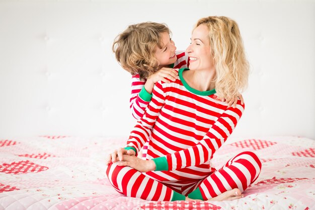 mother and child having fun in christmas time