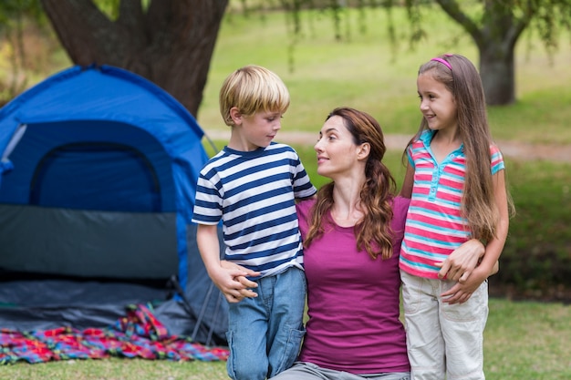 mother and children having fun in the park