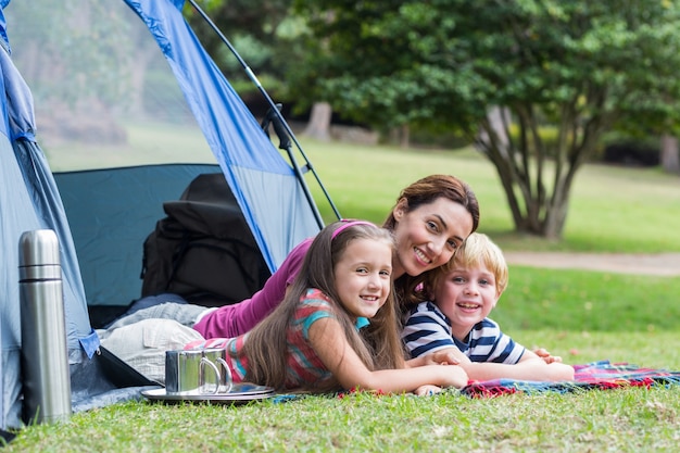 Mother and children having fun in the park