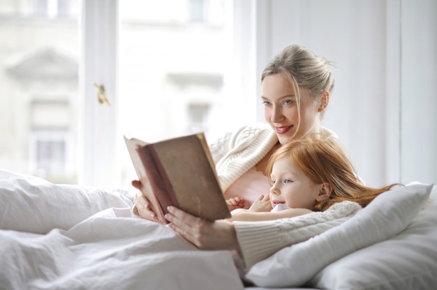 mother and daughter in bed