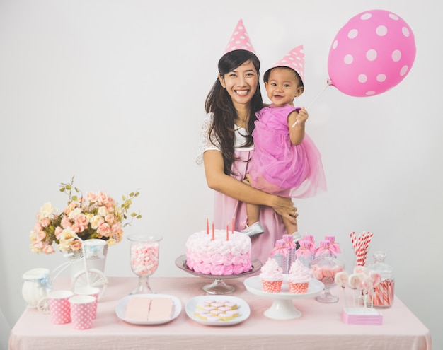 Mother and daughter celebrating birthday