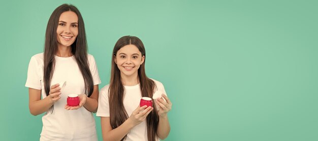 Mother and daughter child banner copy space isolated background\
cheerful mother and daughter