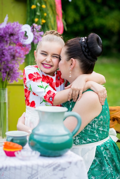 Mother and daughter cooking cupcakes