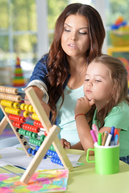 Mother and daughter counting