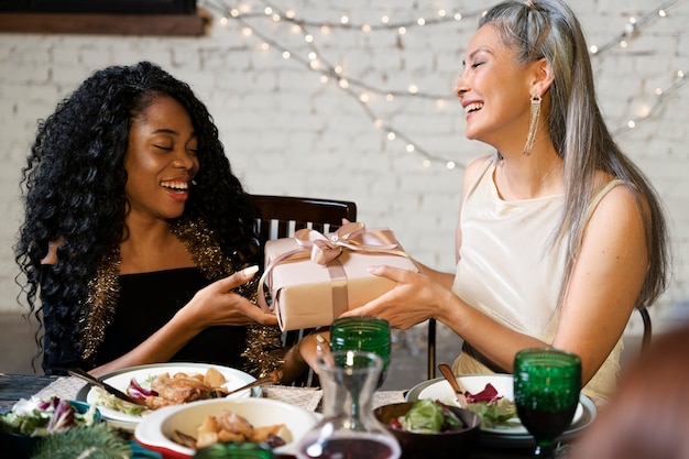 Mother and daughter enjoying a new year party