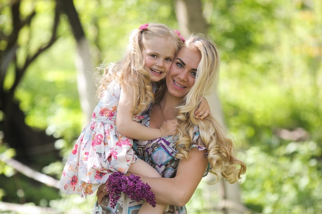 Mother and daughter in the garden