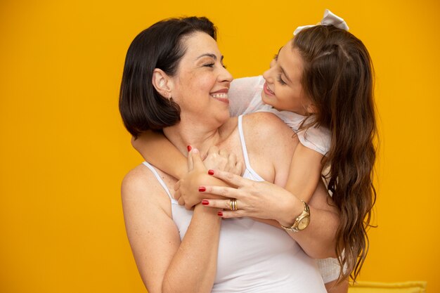 Mother and daughter hugging