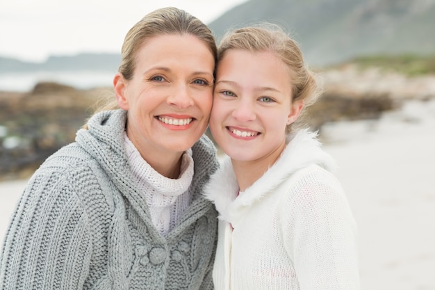 Mother and daughter looking at the camera