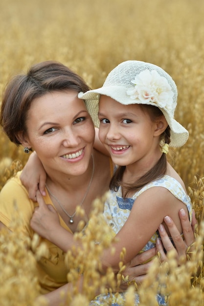 Mother and daughter outdoors