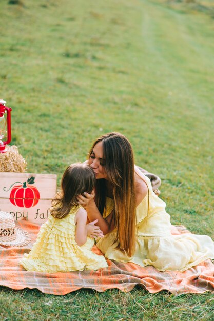 mother and daughter on picnic