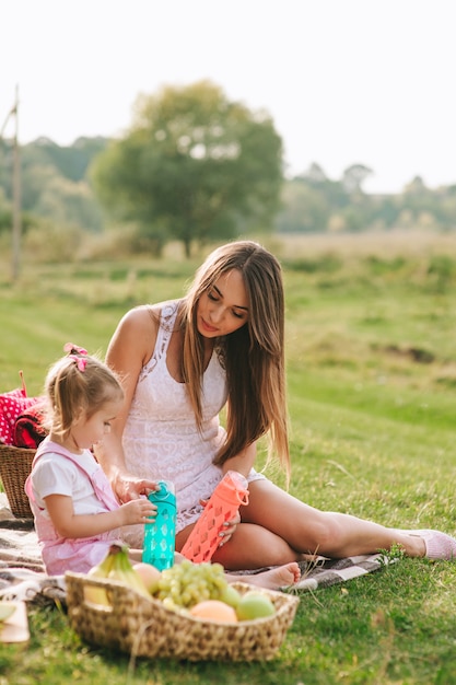 mother and daughter on picnic