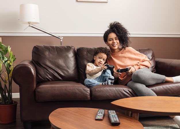 mother and daughter playing game at home