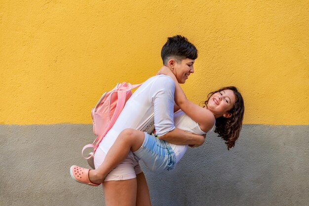 Mother and daughter playing together while going to the beach