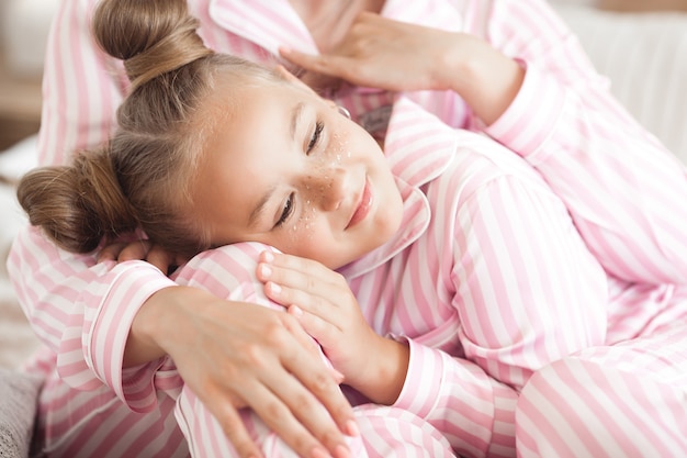 Mother and daughter sleeping