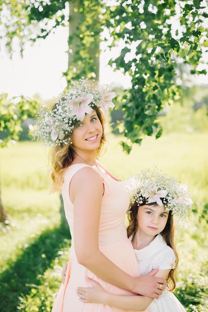 Mother and daughter in the summer outdoors