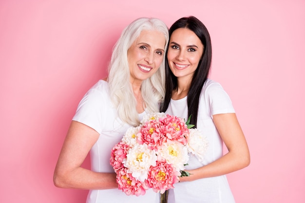 mother and daughter with flowers