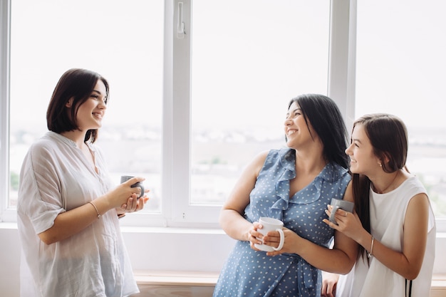 Mother and daughters having fun together