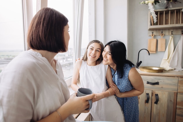 Mother and daughters having fun together