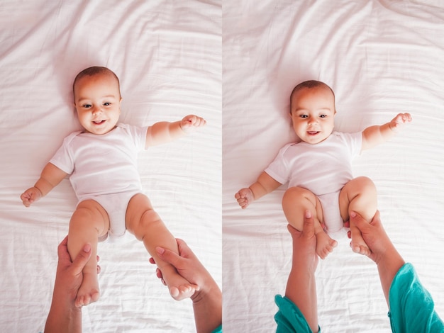 Photo mother do exersices with baby legs cute kid laughing top view on the bed two position