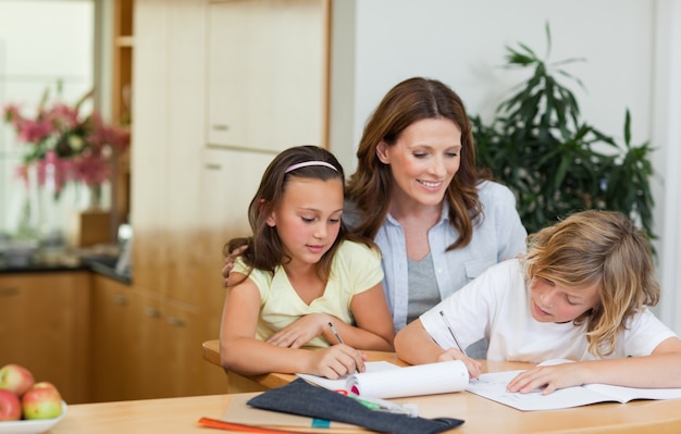 Mother having a look at children's homework