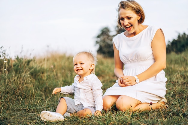 Mother and her little son have fun outdoor