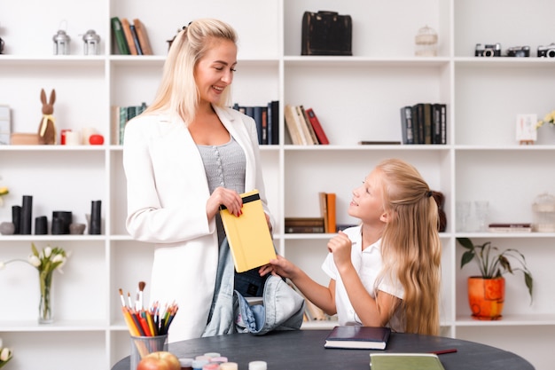 Mother and her lovely daughter make up the portfolio together