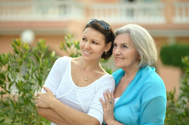 Mother and her nice daughter on tropical resort