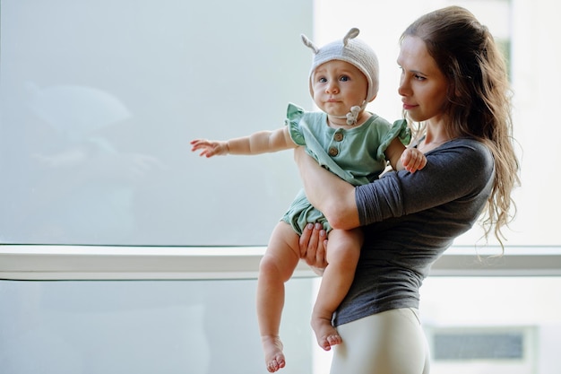 Mother Holding Baby Girl