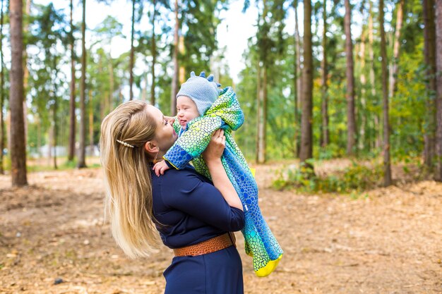 Mother holding her baby joyfully