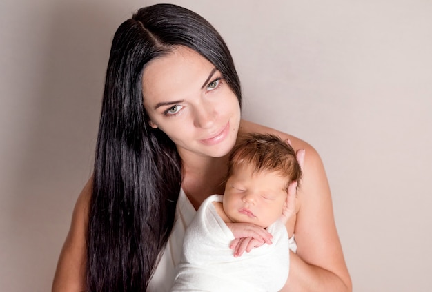 Mother holding little baby