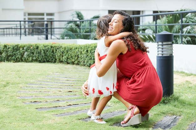 Mother hugging her child