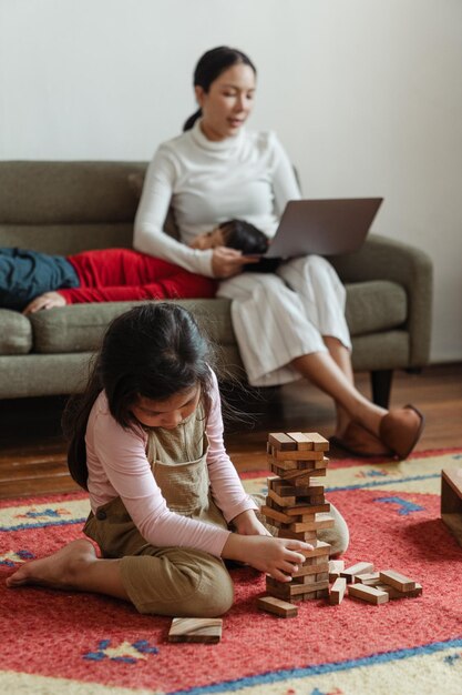 Mother And Kid Playing Game