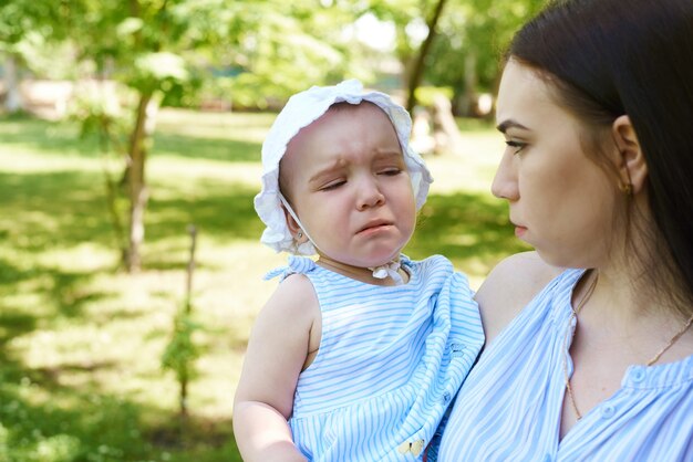 Mother and a little girl in the park