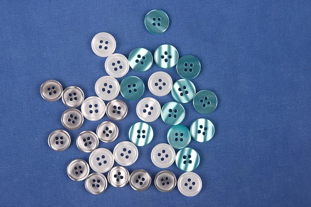 Mother of pearl buttons in blue denim