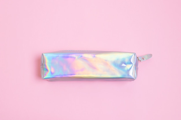 Mother of pearl pencil case on pastel pink . 