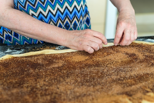 mother preparing a dough 