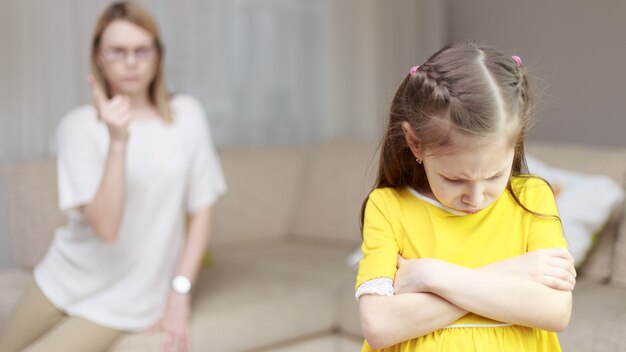 Mother scolds her daughter