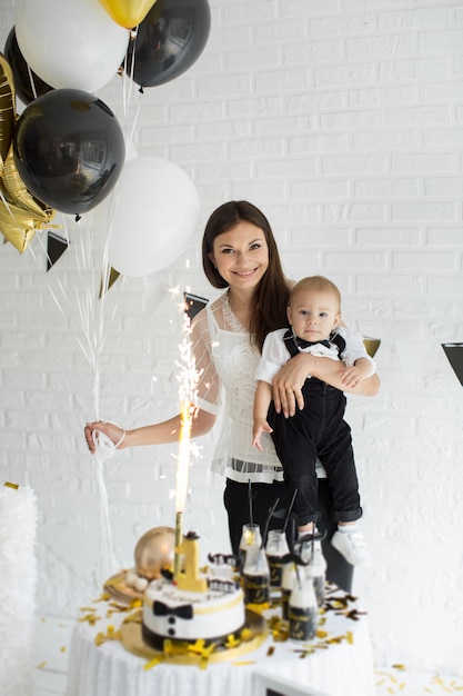 Mother and son celebrating the 1st birthday together