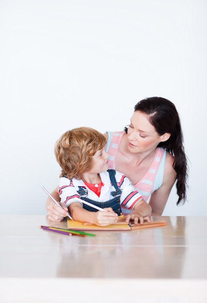 Mother and son doing homework together