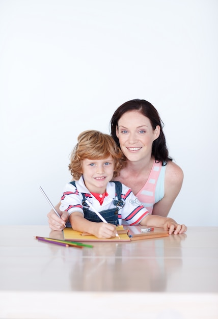 Mother and son drawing with copyspace