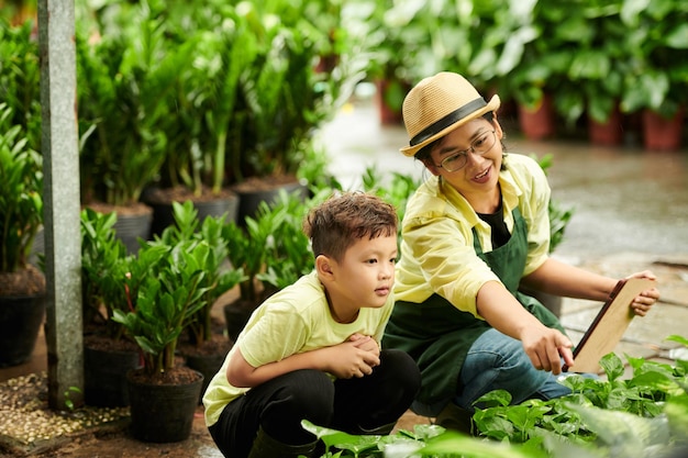 Mother and Son at Flower Nursery