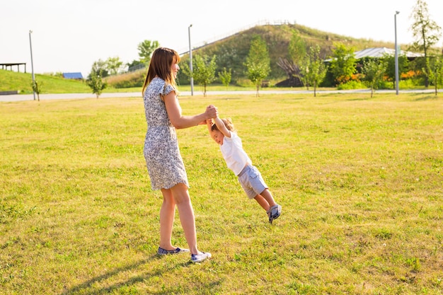 Mother and son playing in the field