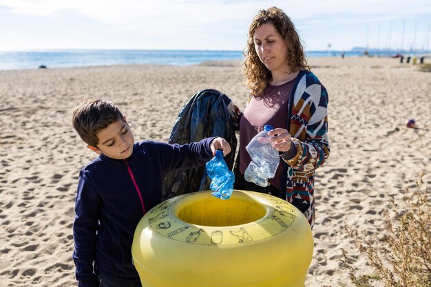 Photo mother and son recycling platic