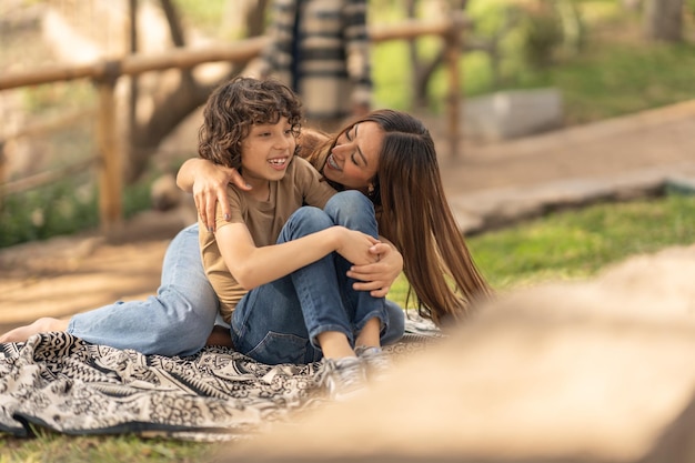 Mother and son together in a park