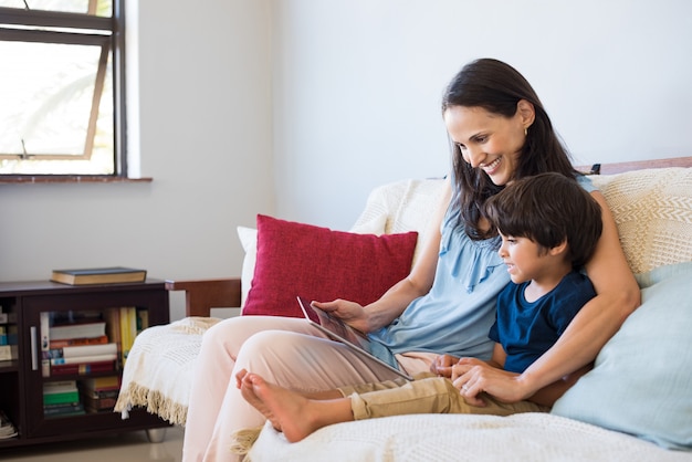 Mother and son using tablet